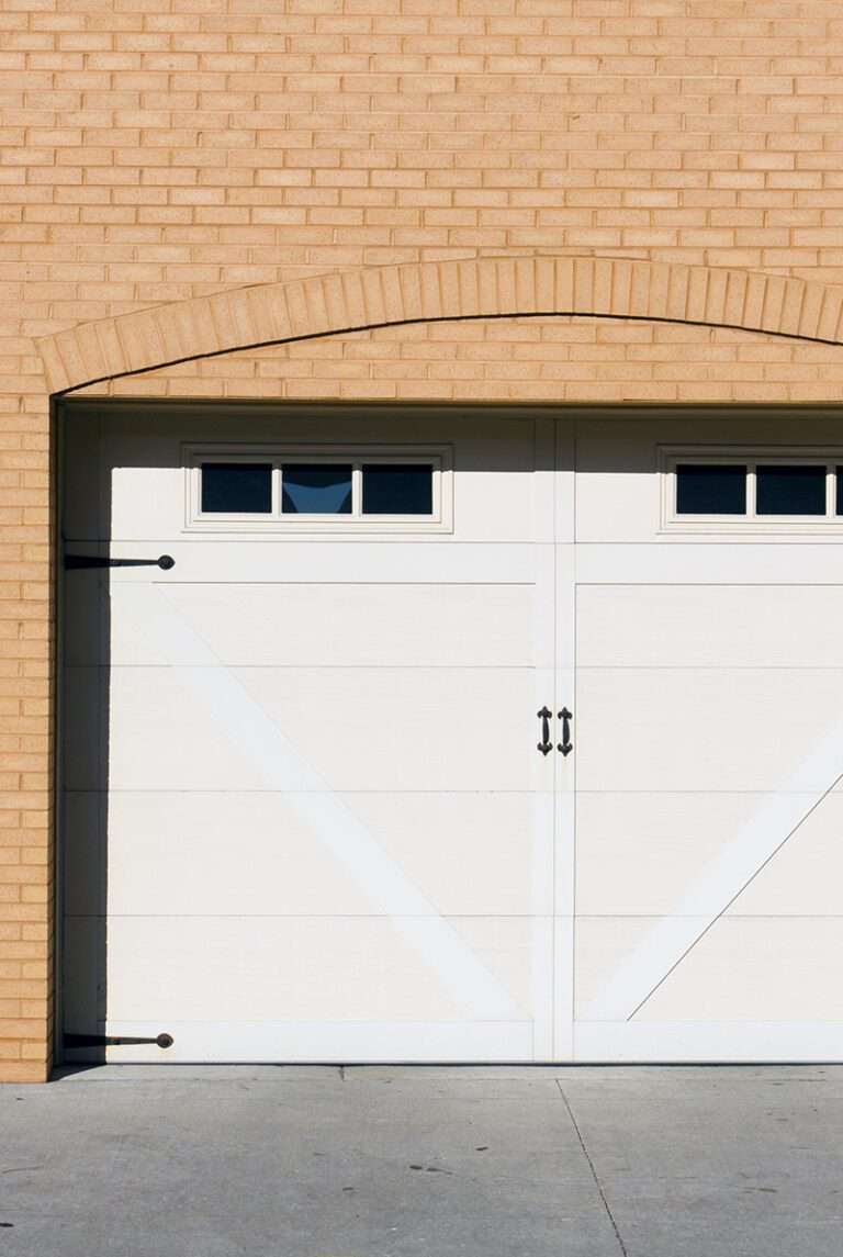 installation dépannage motorisation porte de garage battante ile de france