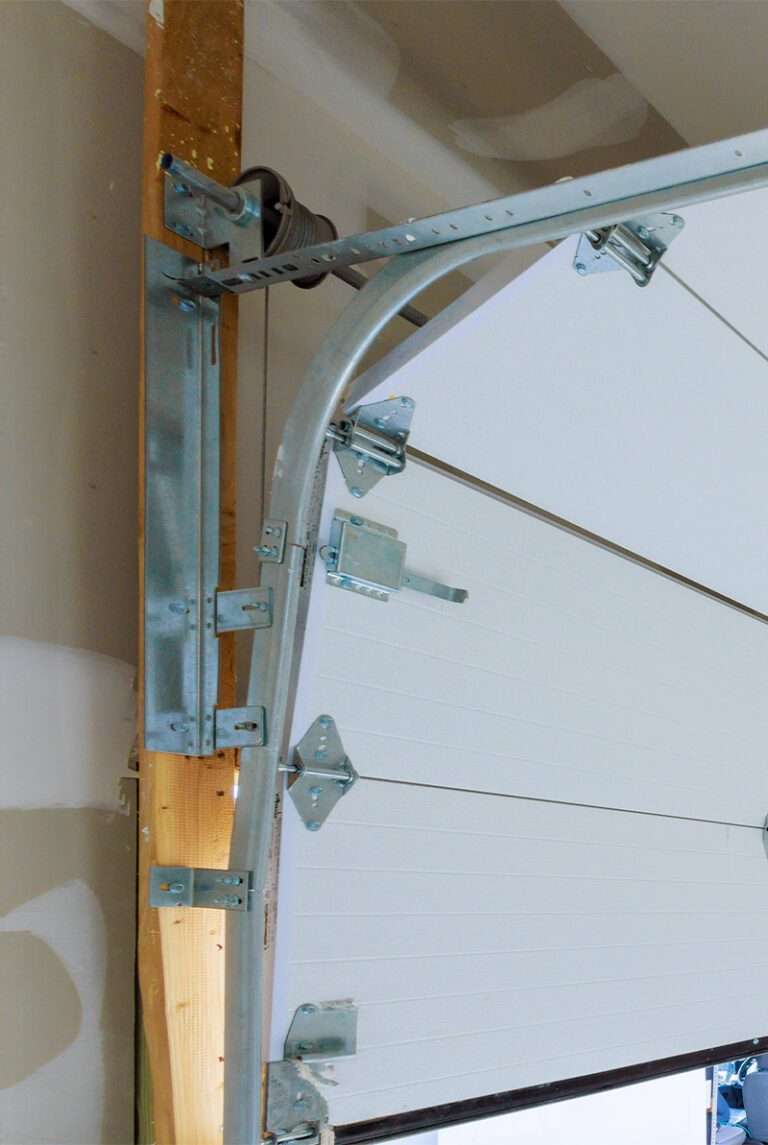 installation dépannage motorisation porte de garage sectionnelle