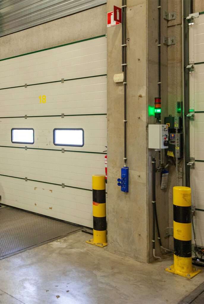 installation dépannage motorisation porte de garage sectionnelle