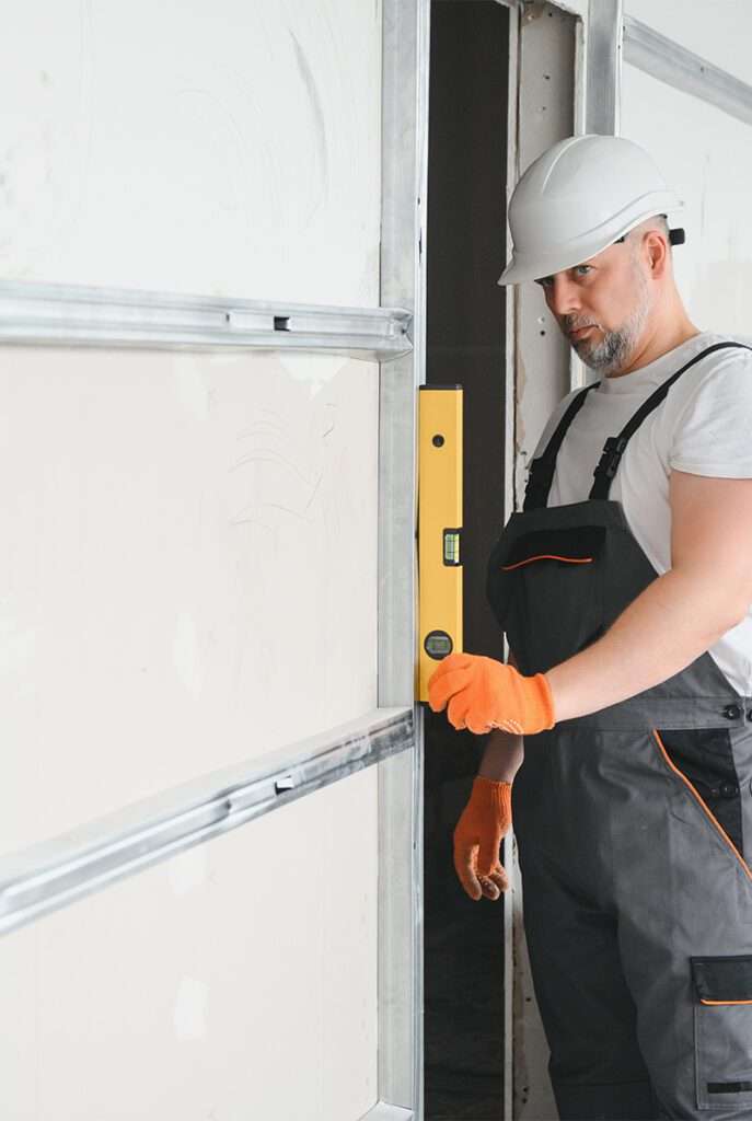 installation dépannage motorisation porte de garage sectionnelle