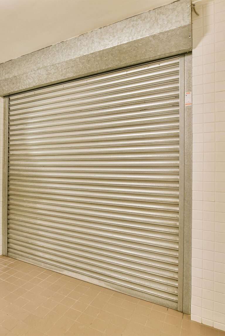 installation dépannage motorisation porte de garage enroulable