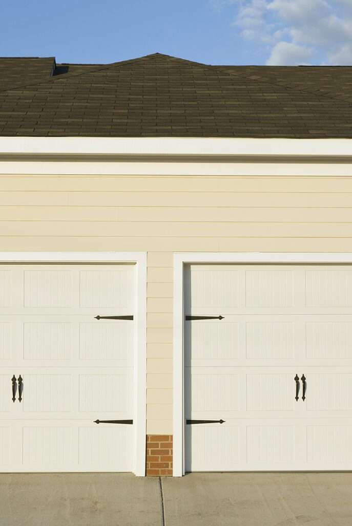 installation dépannage motorisation porte de garage battante ile de france