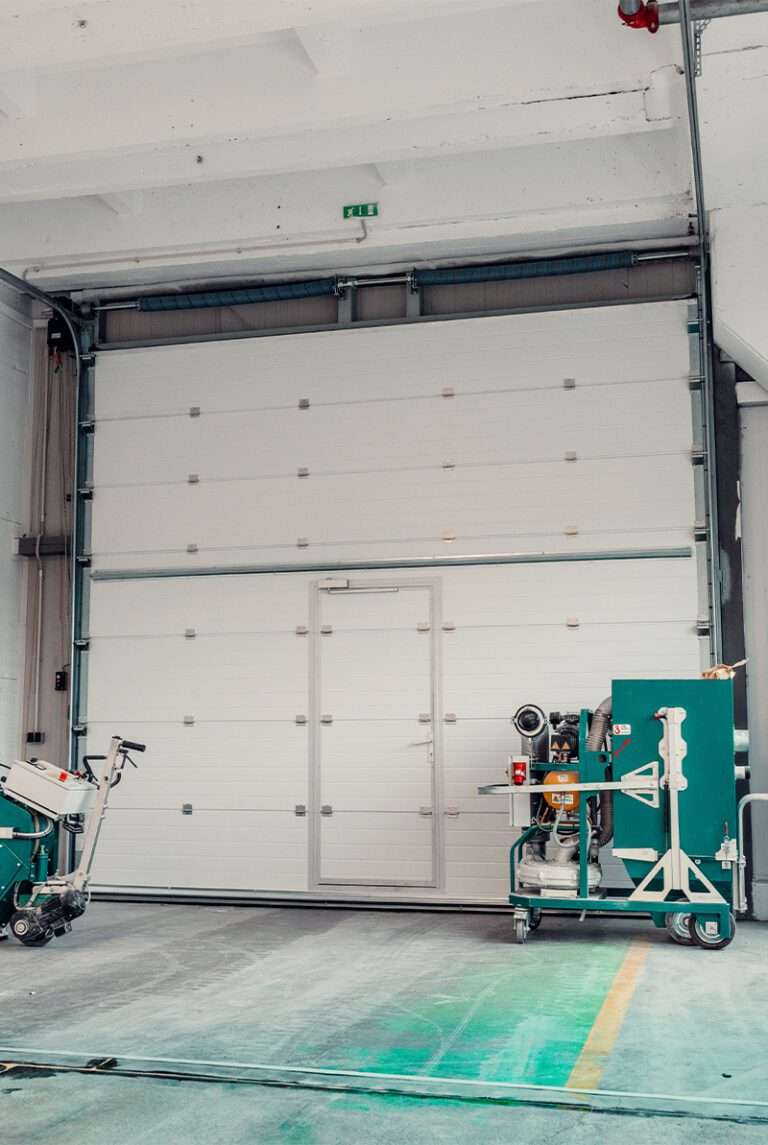 installation dépannage motorisation porte de garage sectionnelle